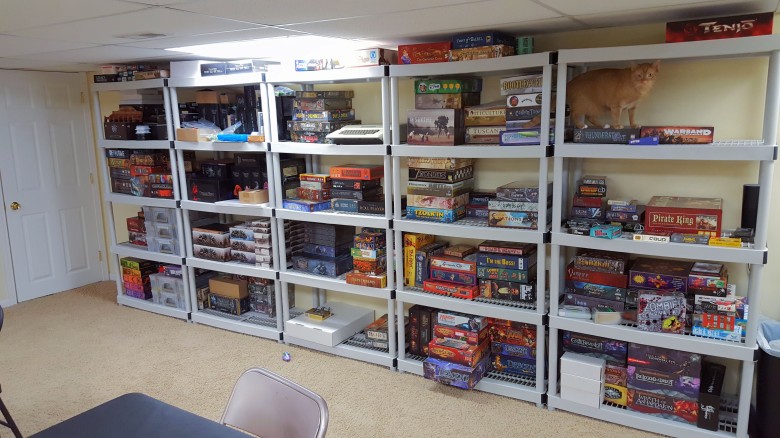 5 plastic shelves with games.